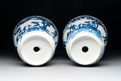 A pair of Chinese blue and white 'birds among flowering branches' jardini&egrave;res, 19th C.