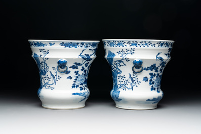 A pair of Chinese blue and white 'birds among flowering branches' jardini&egrave;res, 19th C.