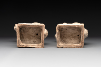 A pair of Chinese white-glazed Buddhist lions, a pair of doves and a pair of iron-red-decorated cranes, Ming and later