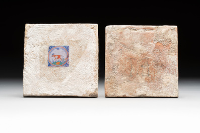 A polychrome Rotterdam 'goat' tile and a Dutch Delft 'flower and insect' tile, 17th C.
