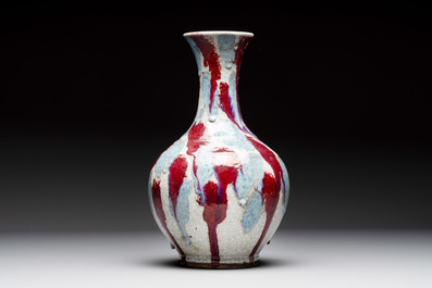 A Chinese flamb&eacute;-glazed ge-type-ground bottle vase, 19th C.
