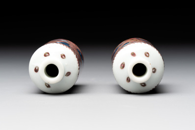 A pair of Chinese blue, white and copper-red 'mythical beasts' and a famille rose 'grasshopper' snuff bottle, Yongzheng and Daoguang mark, 19th C.