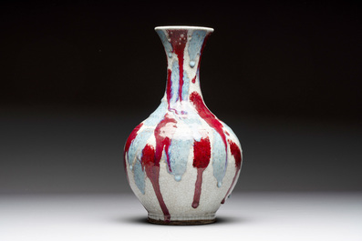 A Chinese flamb&eacute;-glazed ge-type-ground bottle vase, 19th C.