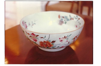A large Chinese famille rose punch bowl with flowering and fruiting branches, Qianlong