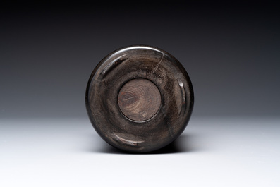A varied collection of three Chinese brush pots, two sculptures, a lacquered covered box and a marble-inlaid wooden table screen, 20th C.
