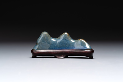A Chinese blue-glazed Yixing stoneware 'lotus' bowl, and a brush rest on wooden stand, 18/19th C.