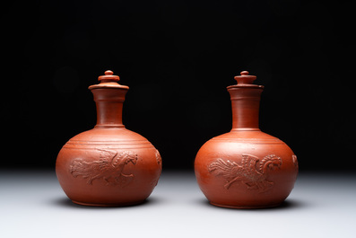 A pair of Yixing-style 'phoenix' bottle vases and covers, possibly England, 18th C.