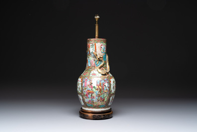 A pair of Chinese Canton famille rose plates, a vase and a shell-form dish, 19th C.