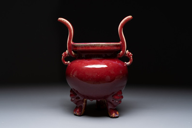A Chinese flamb&eacute;-glazed tripod censer with 'ruyi' handles, 19th C.