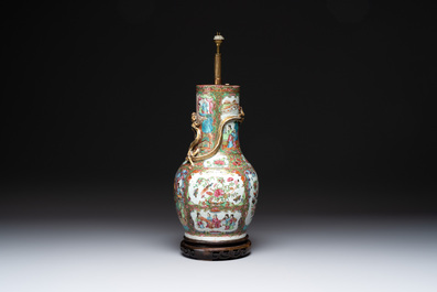 A pair of Chinese Canton famille rose plates, a vase and a shell-form dish, 19th C.