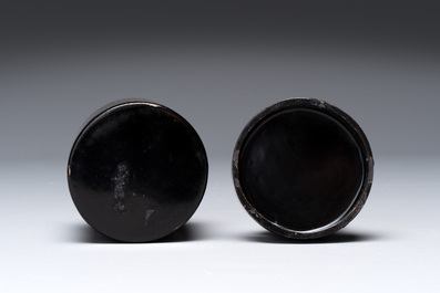 A varied collection of three Chinese brush pots, two sculptures, a lacquered covered box and a marble-inlaid wooden table screen, 20th C.