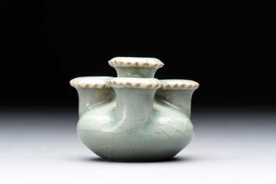 A small and rare Chinese Longquan celadon quadruple-neck vase, Song/Yuan