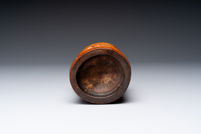 A varied collection of three Chinese brush pots, two sculptures, a lacquered covered box and a marble-inlaid wooden table screen, 20th C.