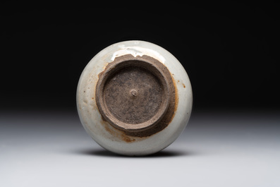 A Chinese 'jun' bowl and a Dehua blanc de Chine group with Guanyin, Ming/Qing