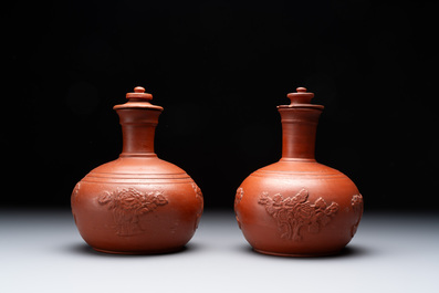 A pair of Yixing-style 'phoenix' bottle vases and covers, possibly England, 18th C.