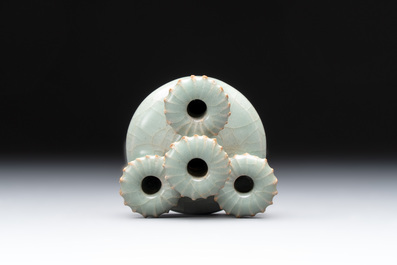 A small and rare Chinese Longquan celadon quadruple-neck vase, Song/Yuan