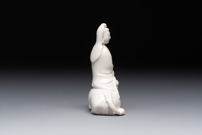 A Chinese 'jun' bowl and a Dehua blanc de Chine group with Guanyin, Ming/Qing