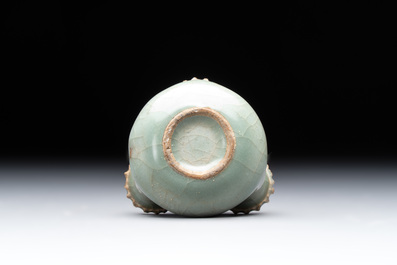 A small and rare Chinese Longquan celadon quadruple-neck vase, Song/Yuan