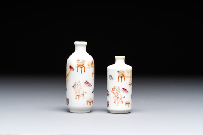 Two Chinese famille rose 'erotic' snuff bottles and a leaf-shaped saucer, 19th C.