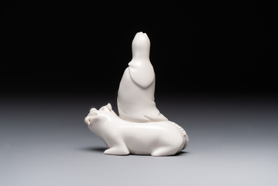 A Chinese 'jun' bowl and a Dehua blanc de Chine group with Guanyin, Ming/Qing