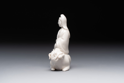 A Chinese 'jun' bowl and a Dehua blanc de Chine group with Guanyin, Ming/Qing