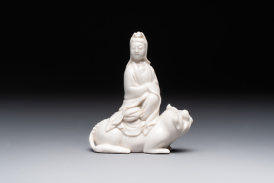 A Chinese 'jun' bowl and a Dehua blanc de Chine group with Guanyin, Ming/Qing