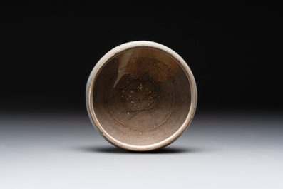 A Chinese 'jun' bowl and a Dehua blanc de Chine group with Guanyin, Ming/Qing