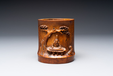A varied collection of three Chinese brush pots, two sculptures, a lacquered covered box and a marble-inlaid wooden table screen, 20th C.