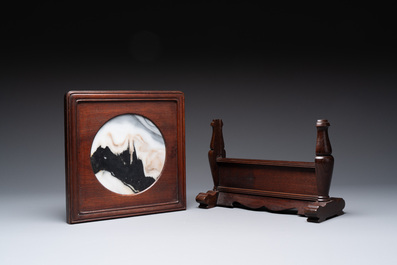 A varied collection of three Chinese brush pots, two sculptures, a lacquered covered box and a marble-inlaid wooden table screen, 20th C.