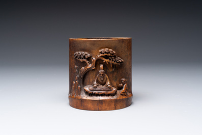 A varied collection of three Chinese brush pots, two sculptures, a lacquered covered box and a marble-inlaid wooden table screen, 20th C.