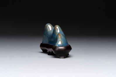 A Chinese blue-glazed Yixing stoneware 'lotus' bowl, and a brush rest on wooden stand, 18/19th C.
