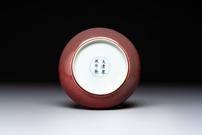 A Chinese copper-red glazed plate, Kangxi mark, 19/20th C.