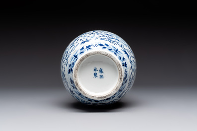 A rare Chinese blue and white crocus-shaped vase with birds among flowers, Kangxi mark, 19th C.
