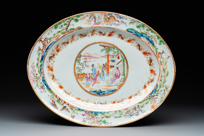 A pair of large Chinese Canton famille rose 'mandarin subject' tureens on stands, 19th C.