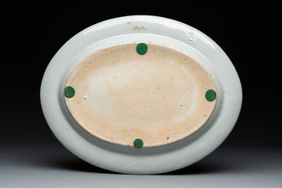 A pair of large Chinese Canton famille rose 'mandarin subject' tureens on stands, 19th C.