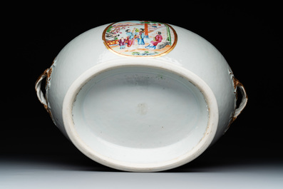 A pair of large Chinese Canton famille rose 'mandarin subject' tureens on stands, 19th C.