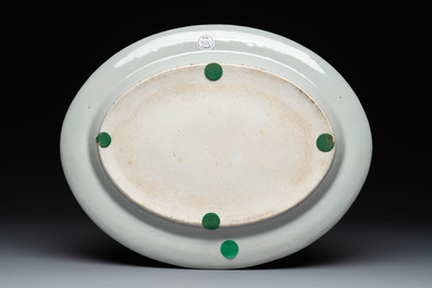 A pair of large Chinese Canton famille rose 'mandarin subject' tureens on stands, 19th C.