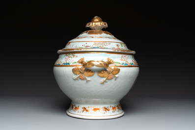 A pair of large Chinese Canton famille rose 'mandarin subject' tureens on stands, 19th C.