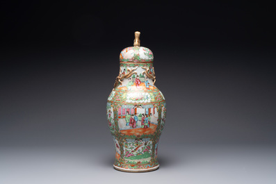 A Chinese Canton famille rose covered vase and two bowls, 19th C.
