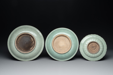 Three Chinese celadon-glazed plates with floral anhua design, 18/19th C.
