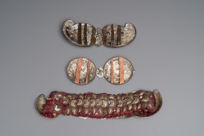 An Ottoman silver-plated wedding belt and two pairs of silver and copper buckles, 19th C.