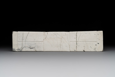 A varied collection of nine Chinese archaistic jade and stone carvings, 20th C.