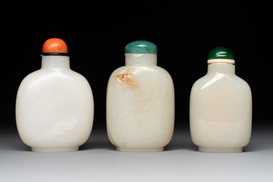 Seven Chinese white and celadon jade snuff bottles, 19th C.