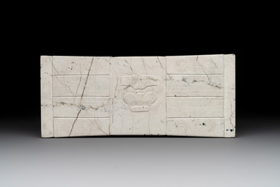A varied collection of nine Chinese archaistic jade and stone carvings, 20th C.