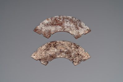 A varied collection of nine Chinese archaistic jade and stone carvings, 20th C.