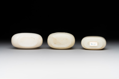 Seven Chinese white and celadon jade snuff bottles, 19th C.