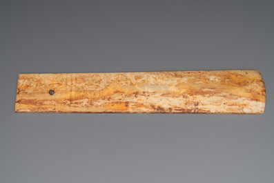 A varied collection of nine Chinese archaistic jade and stone carvings, 20th C.