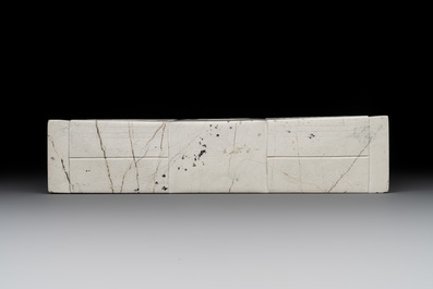 A varied collection of nine Chinese archaistic jade and stone carvings, 20th C.