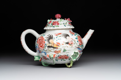 A Chinese famille rose 'rooster' teapot with applied floral design, two cups and a saucer, Yongzheng/Qianlong