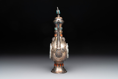 A Chinese jade-inset and hardstone-inlaid silver ewer and cover in Mongolian style, 19th C.
